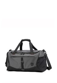 Sac de sport gris et noir en matériau durable, avec deux poignées, une bandoulière ajustable, une poche zippée à l'avant et des coutures contrastées.