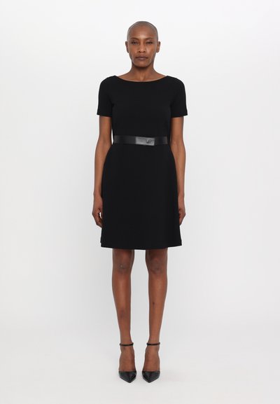 Black short-sleeve dress with a round neckline and a fitted waist, featuring a smooth leather belt and knee-length A-line skirt.