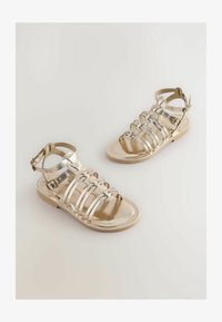 Sélectionné, gold metallic