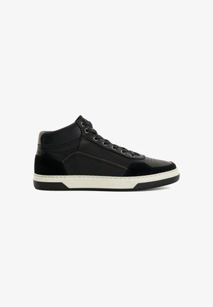 High-top sneaker in black leather and suede with white rubber sole. Features tonal stitching, lace closure, and textured accents.