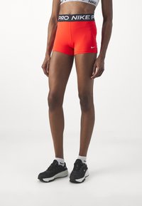 Nike Performance 365 SHORT - Leggings - light crimson/white
