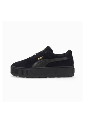 Black platform sneaker with textured sole, black Puma stripe, gold Puma logo, and lace-up design, shown from the outer side.