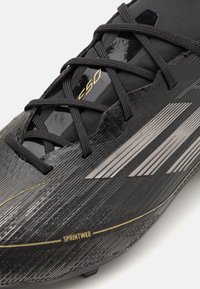 adidas Performance F50 - Voetbalschoenen voor harde ondergrond - core black/iron metallic/gold metallic