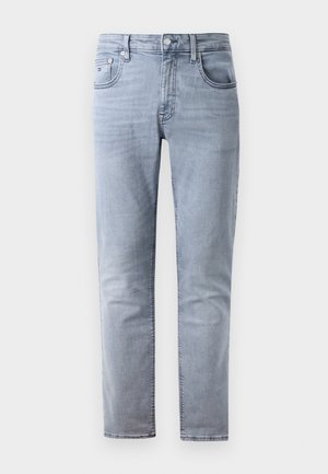 Hellblaue Jeans aus Denim mit geradem Bein, fünf Taschen und Knopfverschluss. Verfügt über dezente Ausbleichungen und eine strukturierte Oberfläche.