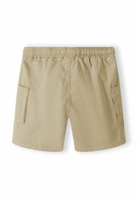 Pantaloni corti beige con vita elastica, due tasche laterali e un tessuto liscio e leggero. Il design è semplice e versatile.