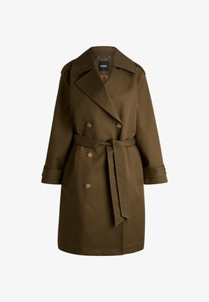 Ruskea kaksirivinen trench-takki, jossa on vyöllä varustettu vyötärö, leveät kaulukset ja kaksi etutaskua. Valmistettu sileästä, teksturoidusta kankaasta.