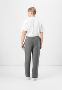 Lacoste - Spodnie treningowe