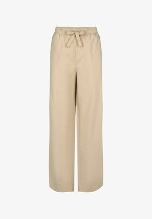 Beżowe spodnie szerokie w nogawkach z elastycznym pasem i związanym sznurkiem. Gładki, lekki materiał o luźnym kroju. Brak widocznych kieszeni.