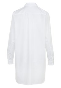 Chemise blanche à manches longues boutonnée, vue de dos avec un col classique et des manches à poignets.