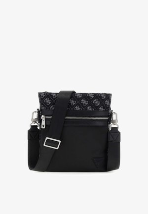 Czarna torba na ramię z regulowanym paskiem, przednią kieszenią na suwak oraz ozdobioną wzorem górną częścią z powtarzającym się logo.