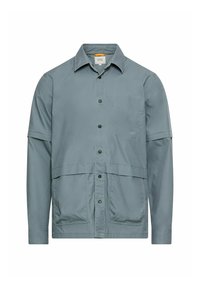 Jasnoniebieska koszula na guziki z kołnierzem typu spread, krótkimi rękawami, dwoma przednimi kieszeniami i prostym krojem. Wykonana z teksturowanej tkaniny.