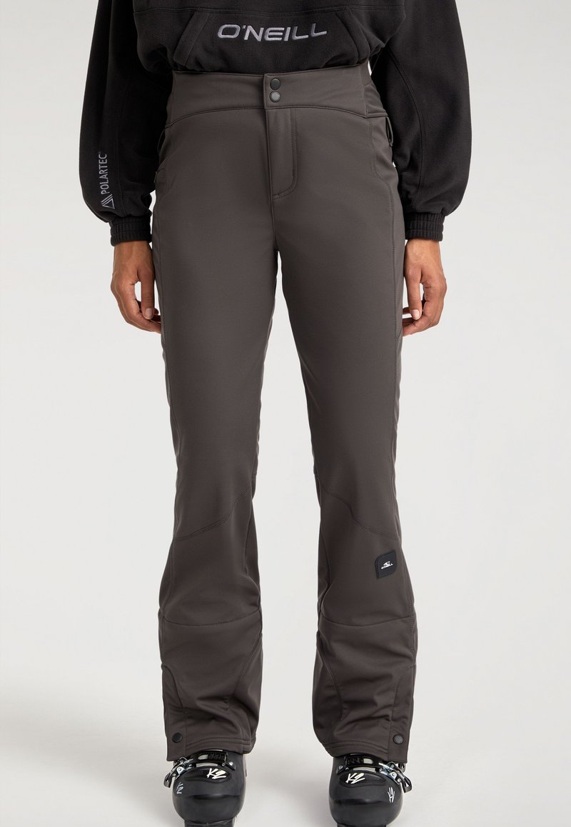 Grijze skibroeken met een getailleerde taille en uitlopende benen, gemaakt van gladde, duurzame stof. Inclusief logodetail en knoopsluiting bij de taille.
