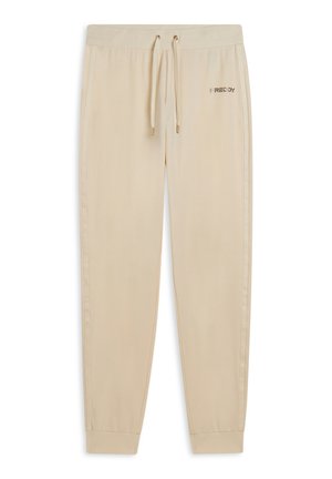 Pantalons de survêtement beiges en tissu doux, avec une taille élastique à cordon de serrage, des chevilles côtelées et un logo discret sur la cuisse.