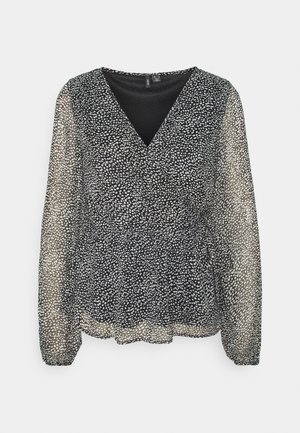 Blusa nera a maniche lunghe con scollo a V, caratterizzata da un motivo a pois bianchi su un tessuto trasparente, vita arricciata e polsini elasticizzati.