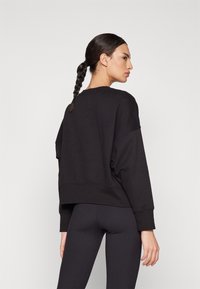 DKNY VARSITY PUFF LOGO SLEEVE - Sweatshirt - black/oat