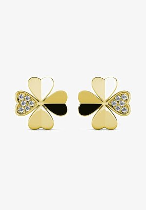 Boucles d'oreilles de couleur or en forme de trèfle, avec des accents noirs brillants et cinq pierres précieuses transparentes disposées en design triangulaire.