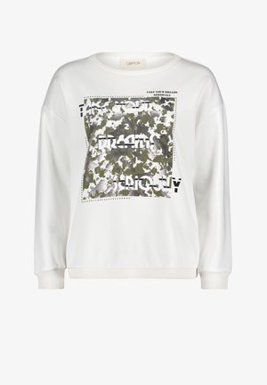 Witte sweatshirt met lange mouwen, voorzien van een textuur grafisch ontwerp in groen en zwart, en tekst die zegt "NEEM JE DROMEN SERIEUS."