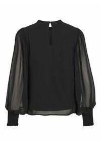 Blusa nera con maniche a sbuffo trasparenti, scollatura rotonda, dettaglio a occhiello sul retro e polsini arricciati. Tessuto morbido con una silhouette fluida.
