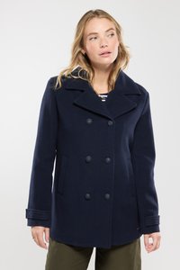 Abrigo de lana azul marino con diseño de doble botonadura, gran cuello y botones negros. Cuenta con bolsillos laterales y puños gruesos.
