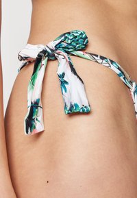 Tommy Jeans HERITAGE KNOT RISE SIDE TIE PRINT - Bikinio apatinė dalis - hawaiian tickled pink