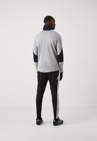 adidas Performance TIRO24 WINTOP - Top dugih rukava - light onix/shock red