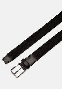 Black woven fabric belt with a silver metal buckle and leather accents on the tip and near the buckle against a white background.