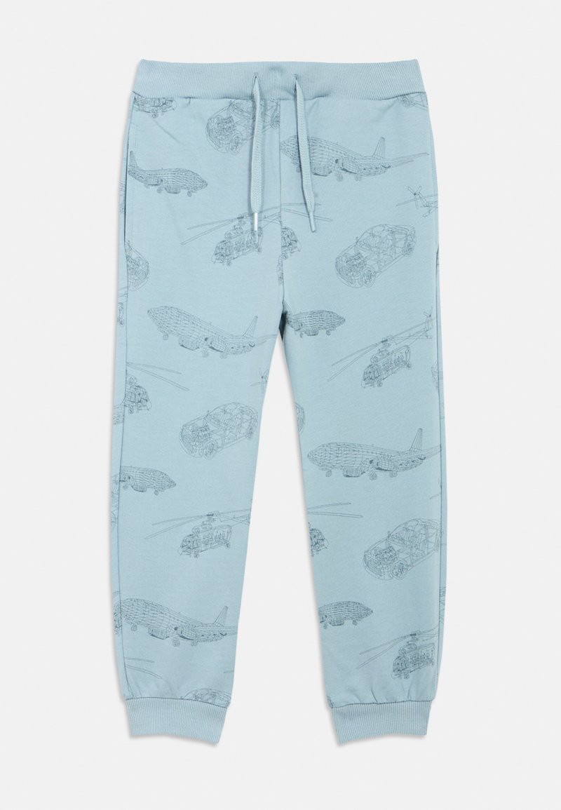 Light blue sweatpants with a printed design of vehicles, including cars and aircraft, featuring an elastic waistband and cuffed ankles.