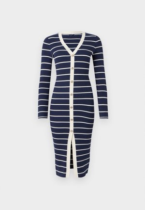 Námornícky prúžkovaný šaty s bielymi pruhmi, výstrih do V, dlhé rukávy, predný zapínací gombík a stredná rozparok. Obsahuje krémové lemovanie.