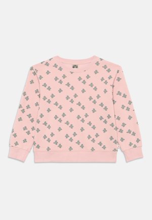 Roza dolga majica s dolgimi rokavi z majhnim zelenim vzorcem kaktusa ter rebrastimi manšeti in robom, položena na belem ozadju.