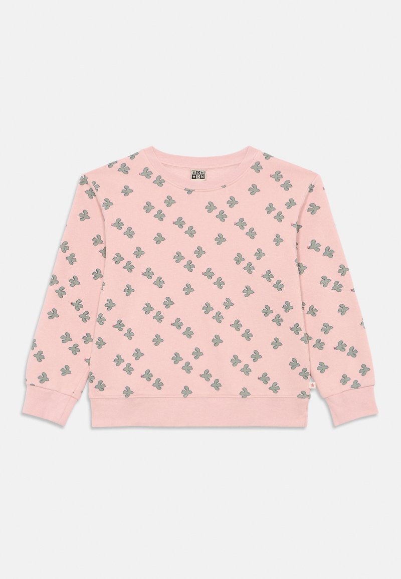 Rózsaszín, hosszú ujjú pulóver, kis zöld kaktusz mintázattal, bordázott mandzsettákkal és aljjal, fehér háttérre fektetve.