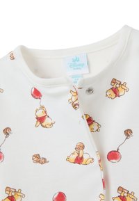 Body in cotone bianco con una stampa ripetuta di Winnie the Pooh che tiene barattoli di miele e palloncini. Chiusura a scatto sul colletto per una facile vestibilità.