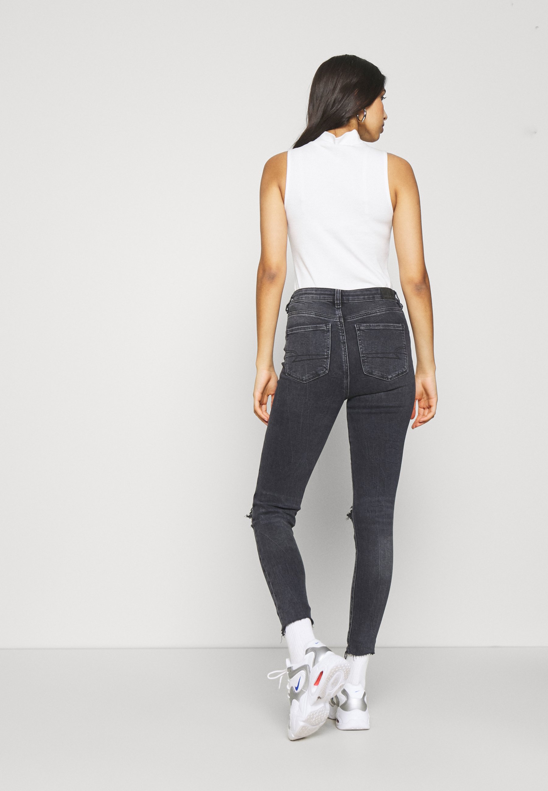 American Eagle HIGHEST RISE JEGGING - Jeggings - black in the dayz/Zwart  denim/blackdenim - Zalando.nl