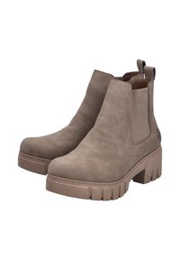 Botas de ante marrón claro hasta el tobillo con paneles laterales elásticos, suela gruesa y tacón corto. Presentan un acabado texturizado y lengüetas.