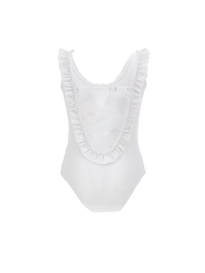 Λευκό ολόσωμο μαγιό με βολάν στο τελείωμα και χαμηλή πλάτη, με διακριτικό τυπωμένο σχέδιο σε διάφανο ύφασμα.