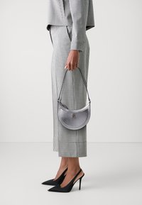 Tommy Hilfiger HOLIDAY SHOULDER BAG - Handbag - silver-coloured