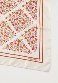 Silk scarf with floral pattern in pink, red, and brown on a cream background, featuring a brown border and a logo in the corner.