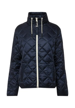 Giubbotto imbottito blu navy con colletto alto, caratterizzato da una texture a diamante e chiusura con zip bianca con dettagli a stringa.