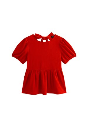 Haut rouge à manches courtes avec un ourlet peplum, tissu texturé, décolleté rond et fermeture à nouer au dos.