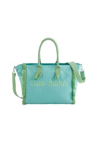 Canvas draagtas in mintgroen met lichtgroene franjes. Voorzien van geborduurde tekst "ciao mare" en een afneembare schouderriem.