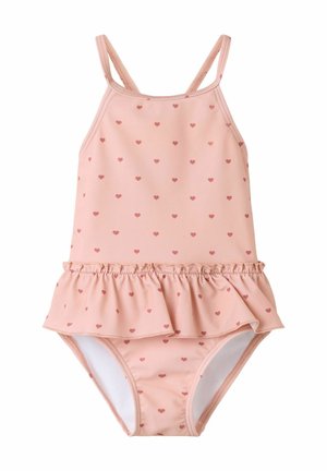 Rožinis vientisas maudymosi kostiumėlis mažiems vaikams, su plonomis petnešėlėmis, mažu raudonų širdelių raštu ir raukšlėtu sijonėliu ties juosmeniu.