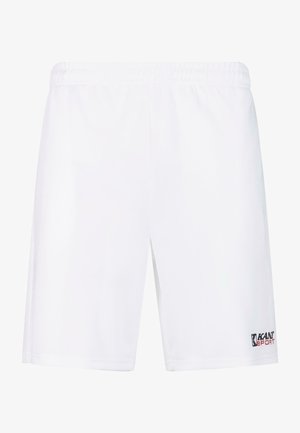 Valged sportlikud lühikesed püksid elastse vöökoha ja siledast, kergest kangast. Alumisel paremal jalal on väike must ja punane logo.