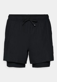 IGNITE SHORTS - Sports shorts - black