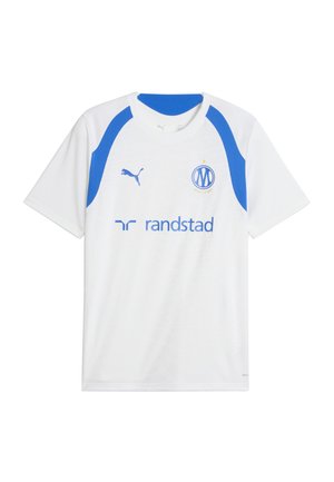 Maglia sportiva bianca con dettagli blu sulle spalle, logo Puma sul petto destro, stemma del club di calcio Marseille sul petto sinistro e testo dello sponsor Randstad al centro.