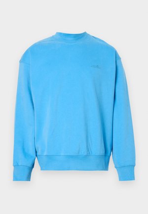 Svetlomodrá mikina vyrobená z bavlneného zmesi, s rebrovaným okrúhlym výstrihom a manžetami, s malým logom na hrudi a voľným strihom.