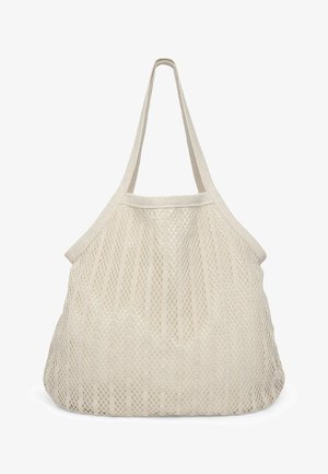 Borsa tote in rete beige con ampie cinghie e motivo a trama aperta. Texture morbida, forma morbida e design minimalista.