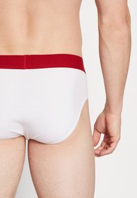 Levi's® SOLID BASIC BRIEF 2 PACK - Slip - white/white