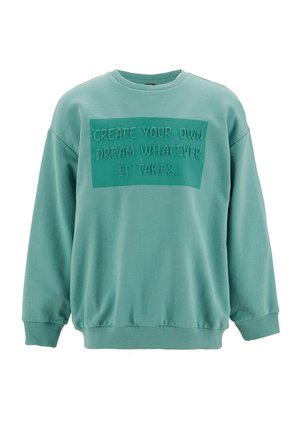 Zielona bawełniana bluza z okrągłym dekoltem, luźnym krojem i teksturą nadrukowanego napisu z przodu: "STWÓRZ SWÓJ WŁASNY SEN, COKOLWIEK TO KOSZTUJE."