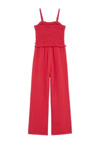 Red, lightweight jumpsuit with smocked bodice and ruffled trim, featuring adjustable straps and wide-legged design. Soft, textured fabric.