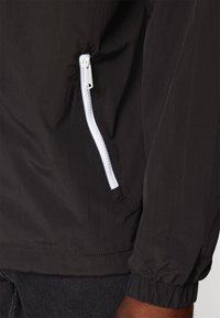 Tommy Jeans CHICAGO  - Vindjacka - black