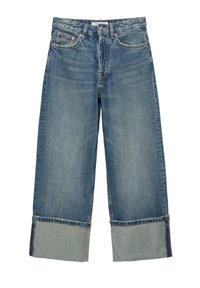 Modre jeans hlače iz jeansa z širokimi hlačnicami in velikimi zloženimi robovi na dnu, z sprednjimi žepi in zankami za pas.